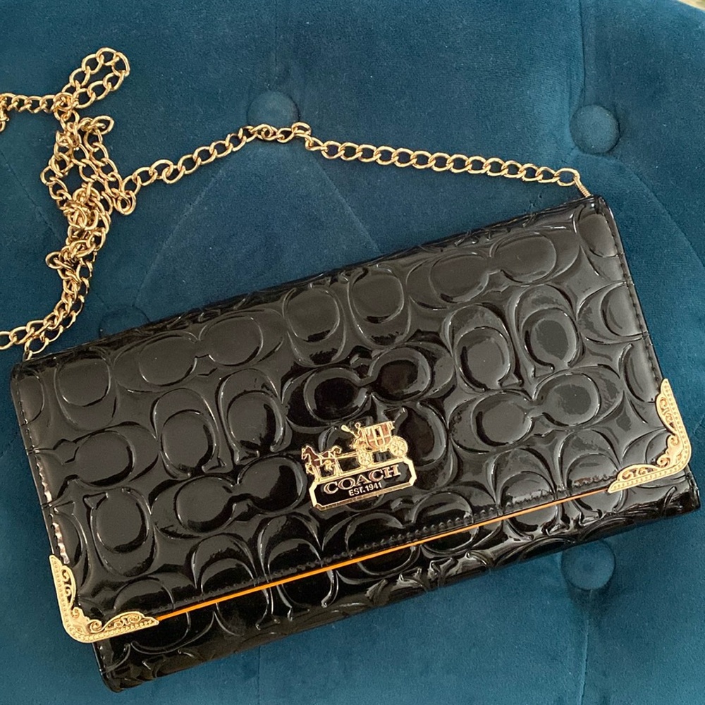Coach Black Patent Leather Signature Embossed Clutch with brass hardware & strap